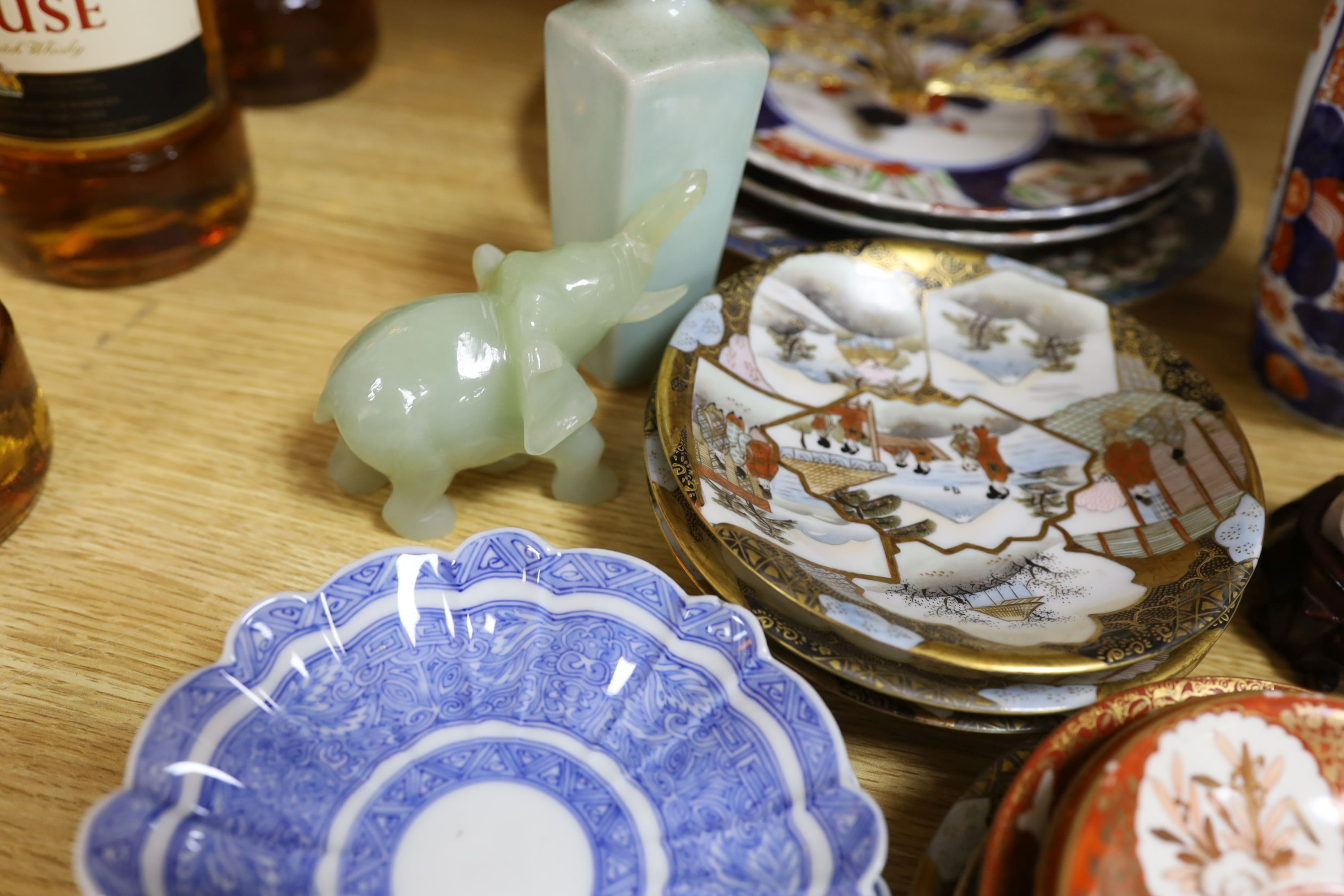 Selection of various Chinese and Japanese ceramics, together with a jade elephant and bowenite figure